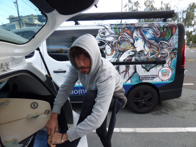 surfer wearing a hoodie