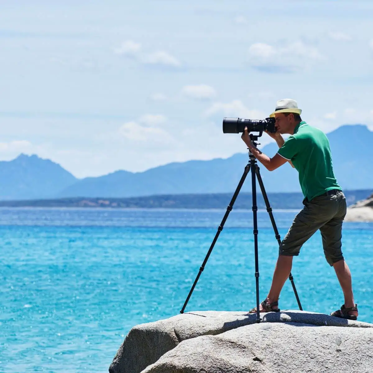 Photographer with the ocean in the background